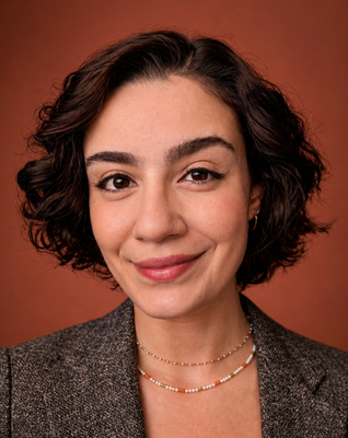 Portrait of Crystal Albuquerque Accioly Oliveira, Associate.
